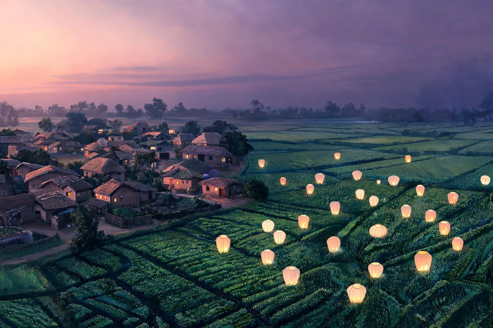 Lanterns scattered across fields seen from the air at dawn